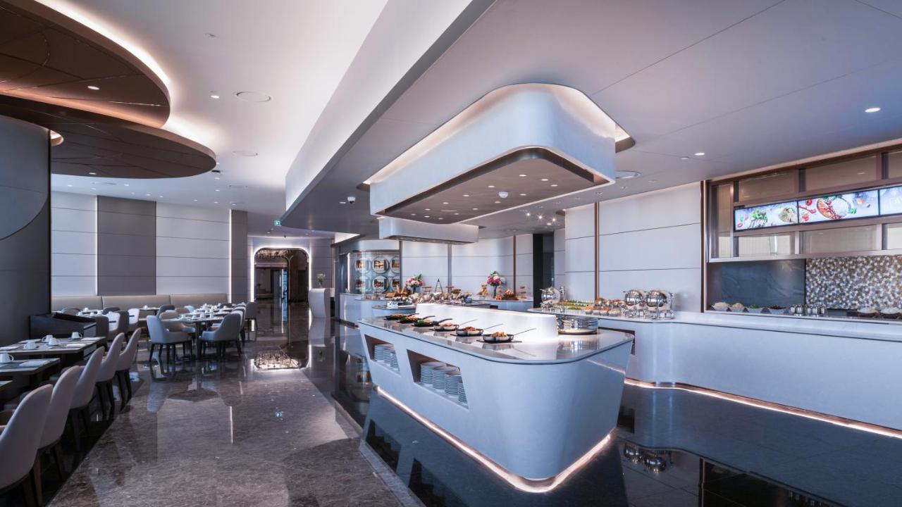 Grande Centre Point Space Pattaja Kültér fotó The buffet at the lounge
